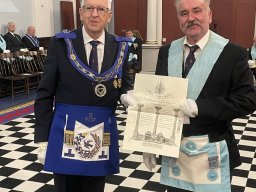 Bro. Nigel Farrow being presented his Master Mason's Certificate by W. Bro. Barry Palmer